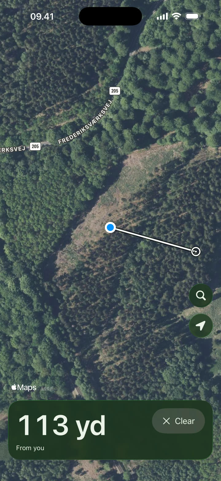 Jagtafstand showing 113 yd from the blue dot to a point on the aerial photo, with a line between them.